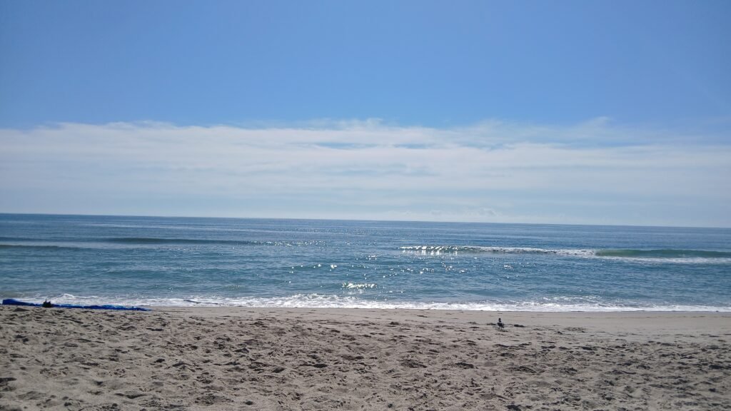 Waves crashing into a beach