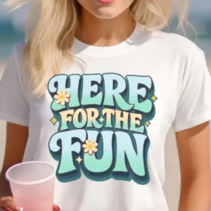 unisex t-shirt with retro “Here For The Fun” groovy text graphic in teal and yellow with flowers and sparkles