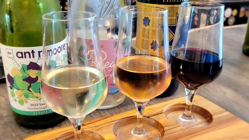 wine glasses half full of wine at one of the Best Beach Bars on the Grand Strand
