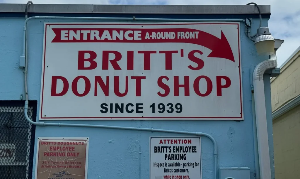 Sign for britts donut shop on the carolina beach boardwalk