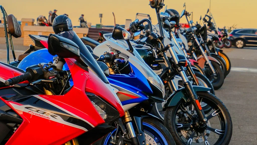 Row of sport bikes including a Honda CBR Fireblade lined up at sunset during Myrtle Beach Bike Week